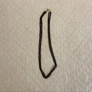 Kendra Scott sparkly black/gold long necklace